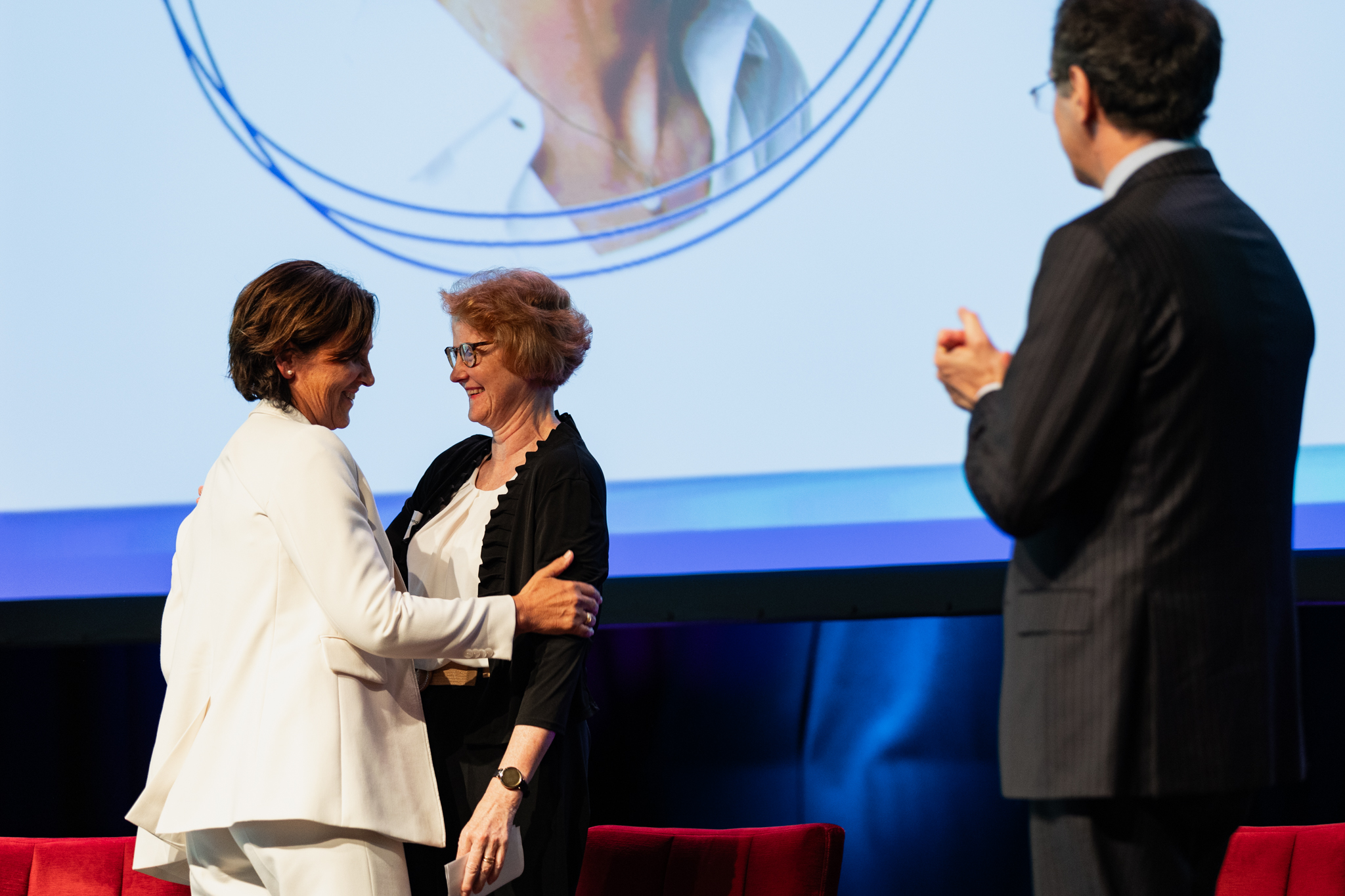 Participants greeting one another at the Oslo Summit